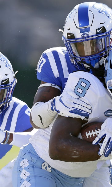 Duke holds off rival UNC 42-35 to keep Victory Bell